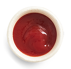 Ketchup side in a dish
